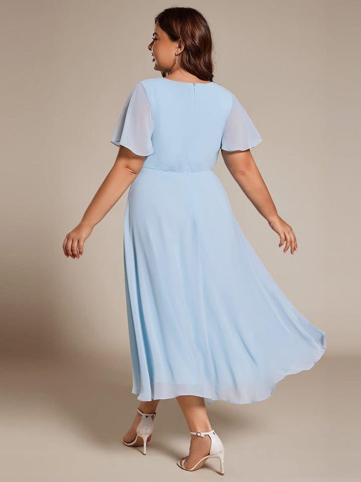 Regina – Vestido midi de gasa con mangas vaporosas