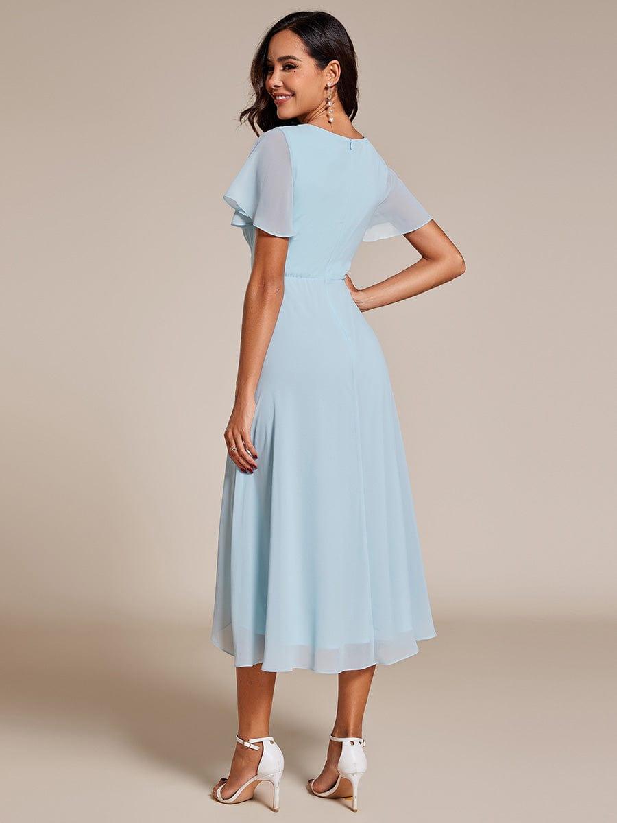 Regina – Vestido midi de gasa con mangas vaporosas