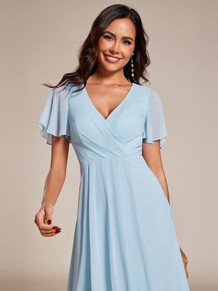 Regina – Vestido midi de gasa con mangas vaporosas