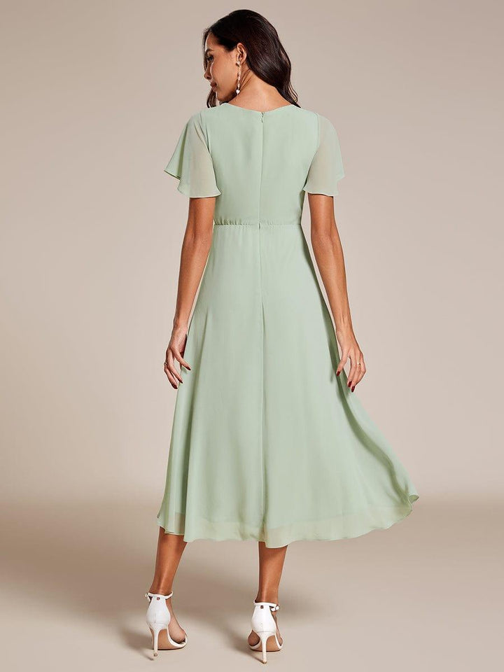 Regina – Vestido midi de gasa con mangas vaporosas