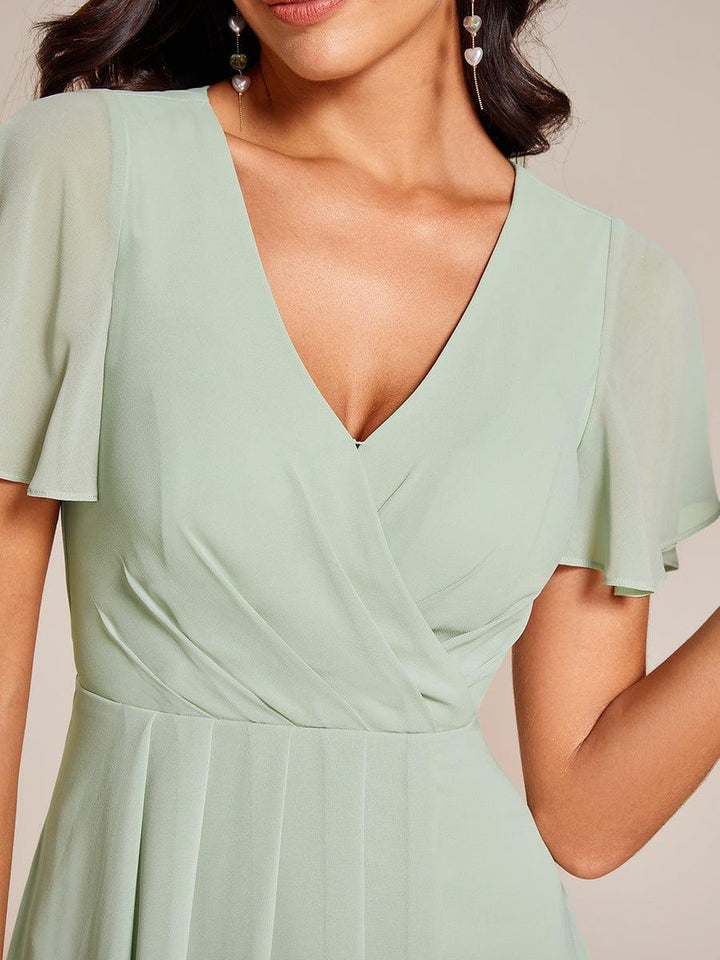 Regina – Vestido midi de gasa con mangas vaporosas