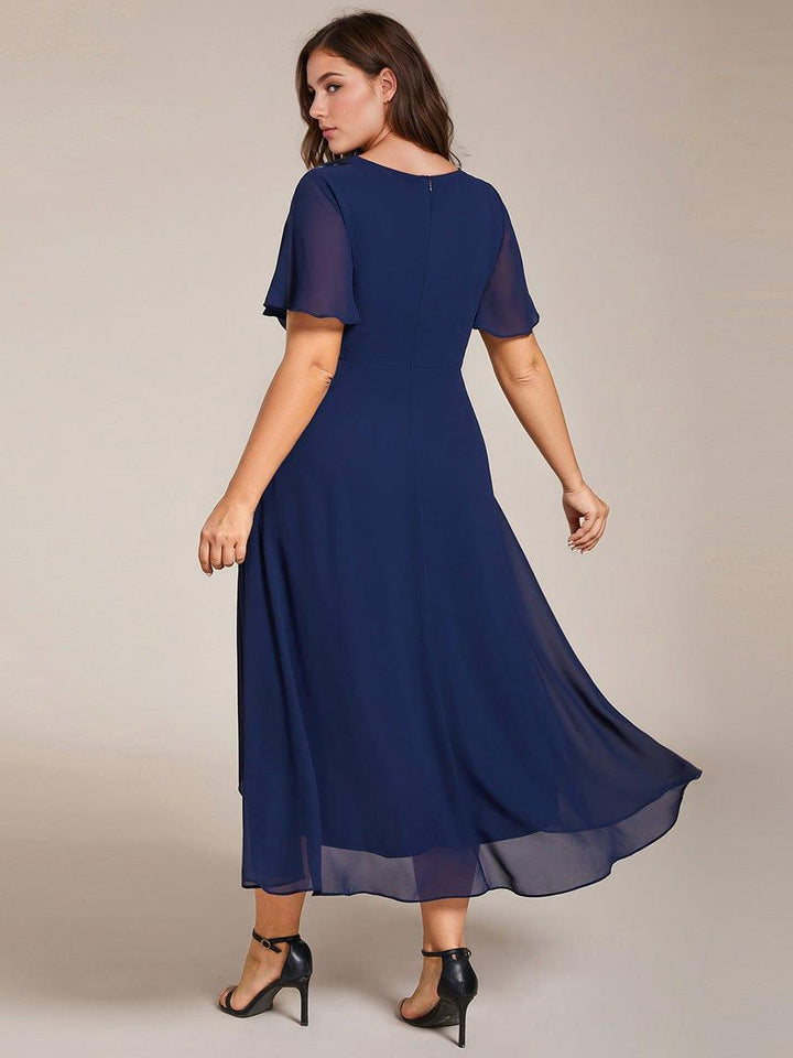 Regina – Vestido midi de gasa con mangas vaporosas