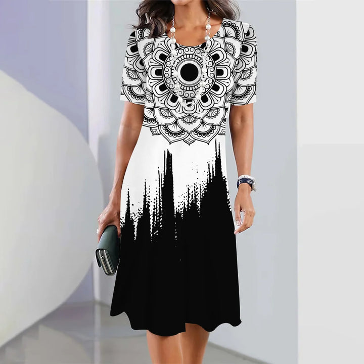 Adele – Vestido midi con estampado y cuello redondo