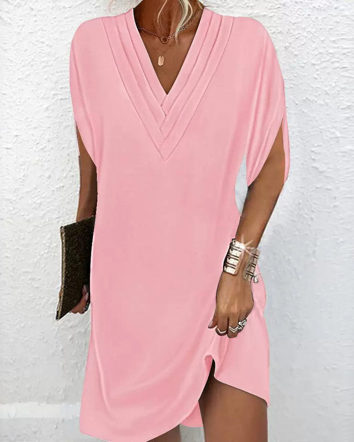 Sol - Elegante vestido monocolor con mangas abiertas