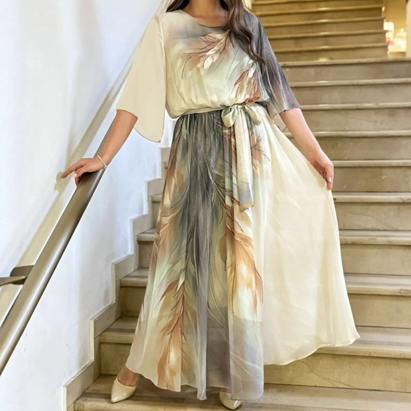 Alaia – Vestido maxi estampado con cinturón y cuello redondo
