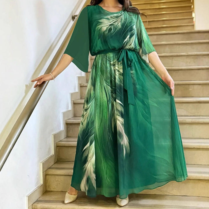Alaia – Vestido maxi estampado con cinturón y cuello redondo