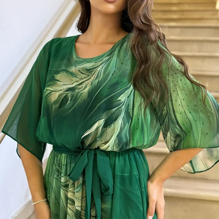 Alaia – Vestido maxi estampado con cinturón y cuello redondo
