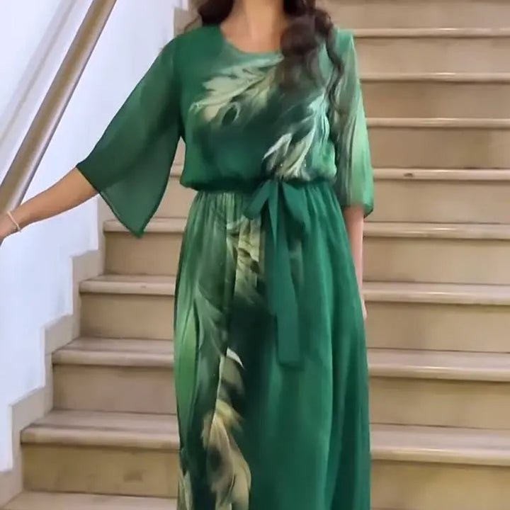Alaia – Vestido maxi estampado con cinturón y cuello redondo