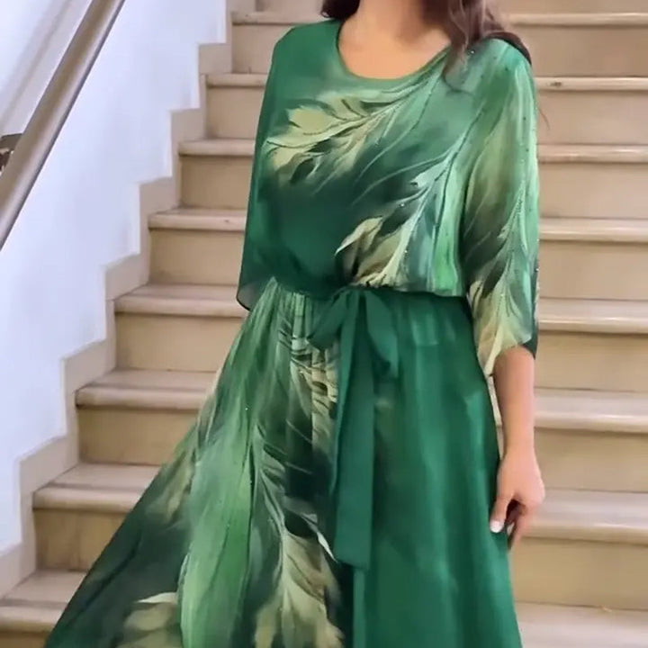 Alaia – Vestido maxi estampado con cinturón y cuello redondo